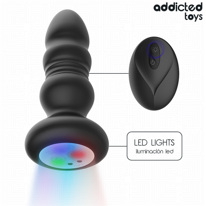 ADDICTED TOYS - PLUG ANAL GIRATORIO VIBRATORIO CON LUZ LED Y CONTROL REMOTO