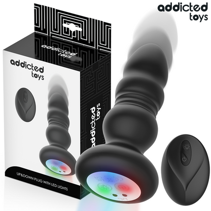 ADDICTED TOYS - PLUG ANAL GIRATORIO VIBRATORIO CON LUZ LED Y CONTROL REMOTO